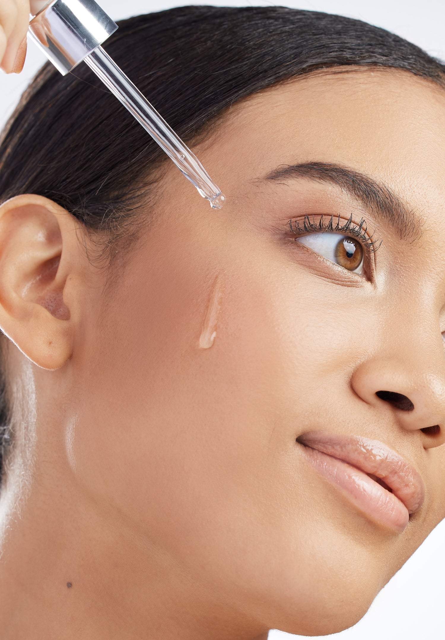 serum pipette on female face